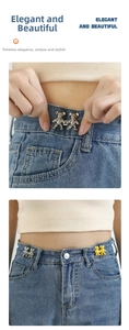 Close-up of cute bear-shaped adjustable waist buckle pins on denim fabric jeans