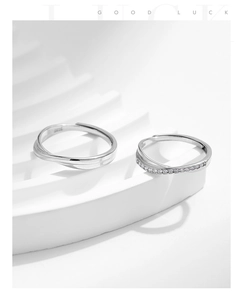Macro shot of S925 sterling silver Mobius rings with polished finish and pavé stones