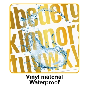 Close-up of waterproof gold vinyl letter stickers with realistic splashing water droplets