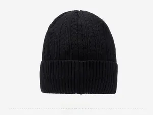 Rear view of black knitted beanie showing thick knit texture and wide folded cuff