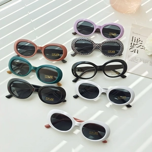 Fashionable oval kids sunglasses with UV400 protection in various trendy vintage colors