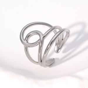 Macro shot of silver layered geometric intertwined ring with an adjustable open band