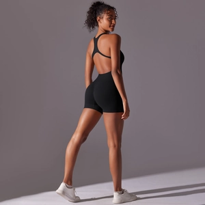 Close-up of racerback design on backless black seamless yoga bodysuit for fitness