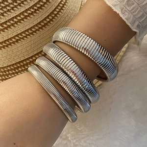 Minimalist silver elastic spring bracelet set for women in stacked style
