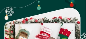 Close-up of festive Christmas stockings with snowman and elf designs on a mantel