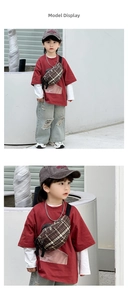 Detailed close-up of children's vintage brown plaid crossbody bag with nylon strap