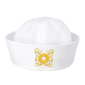 Close-up of white sailor hat featuring detailed yellow anchor embroidery and canvas texture