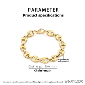 Macro detail of golden stainless steel pig nose chain link with lobster clasp closure