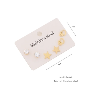 Three-pair earring set featuring gold hearts and stars on a stainless steel card