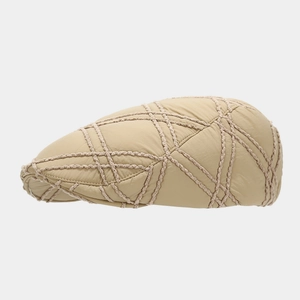 Detail view of khaki quilted texture and stitching on the windproof thermal beret hat