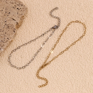Detail of 14K gold and silver plated heart chain anklets with adjustable lobster clasp
