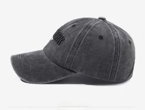 Side view of washed cotton baseball cap with vintage New York 3D embroidery detail
