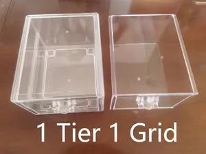 Close-up of clear acrylic drawer organizer with semicircular handle on a wooden table