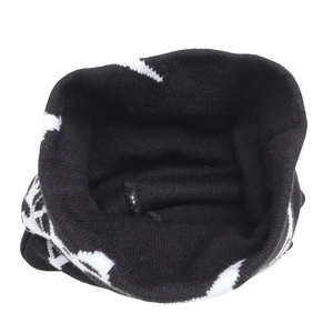 Inside view of spider web jacquard beanie showing smooth knit texture and warm material