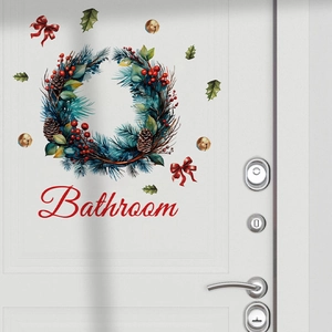 Detailansicht eines Weihnachts-Türkranzaufklebers mit blauen Tannennadeln und Glocken