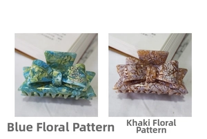 Detailed view of handmade acetate bow hair claws with sparkling rhinestone accents