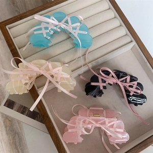 Ballet style acetate claw clips with ribbons in blue, cream, black, and pink colors