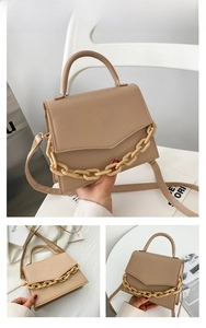 Detail showing the khaki PU leather crossbody bag with a thick decorative resin chain