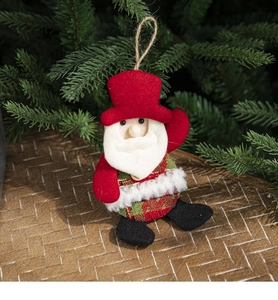 Detail of fabric Santa ornament with plush beard and plaid shirt on a green Christmas tree