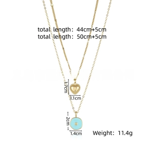 Detail of 18K gold-plated double-layer necklace with heart and blue star pendant charms
