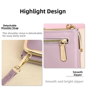 Detailed macro of golden zipper with brand logo and detachable strap hook on purple bag