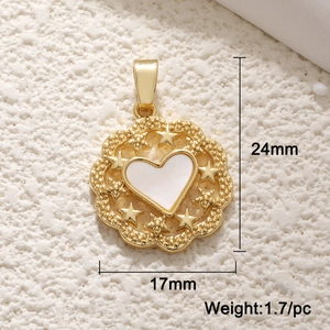 Macro shot of 24mm gold heart pendant with white enamel inlay and star details