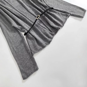 Chic grey knitted wool coat for women featuring a stylish black belt with golden buckle