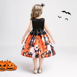 Back view of girls Halloween pumpkin witch dress with orange printed skirt and bow