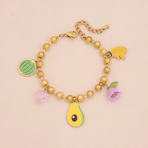 Golden beaded necklace set with colorful fruit pendants like watermelon and avocado