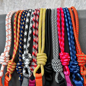Detail of multi-color woven straps with handmade knots and lanyard attachments