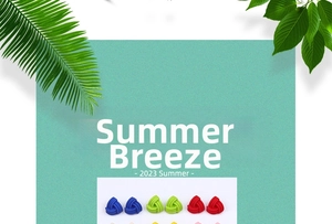 Detail of colorful acrylic triangle earrings with fine spiral texture in summer shades