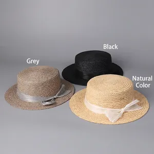 Flat top raffia boater hats with silk bows in grey, black and beige for women