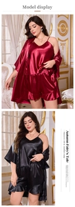 Three-piece satin sleepwear set featuring camisole, ruffled shorts and robe in wine red