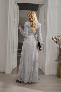 Detail view of silver sequin midi dress showing V-neck design and back waist belt detail