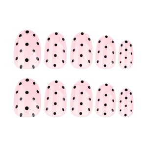 Faux ongles ovales courts rose tendre avec motifs classiques à pois noirs élégants