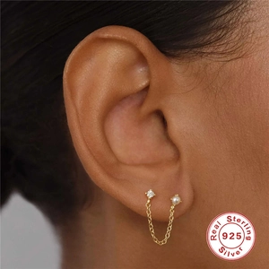 Elegant S925 sterling silver chain earrings with pearl and zircon on model ear