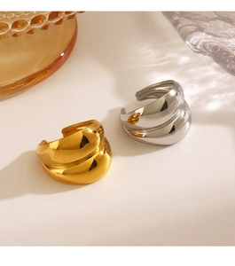 Polished chunky C-shaped geometric ring set in gold and silver finish with glass decor