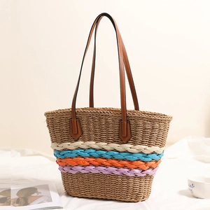 Bohemian woven straw tote bag with rainbow stripes and brown shoulder straps