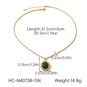 Detail showing dimensions of vintage gold necklace with green semi-precious stone pendant