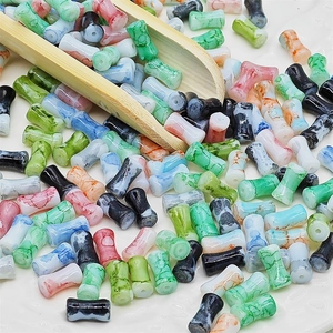 Bamboo shaped marble glass beads 6x12mm in mixed colors with wooden scoop display