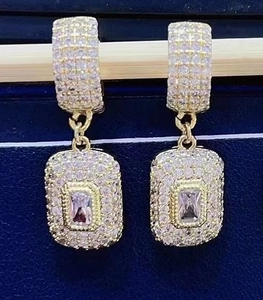 Elegant gold square drop earrings with pave micro-inlaid zircons on blue jewelry box