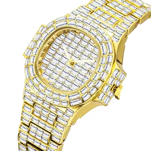 Luxurious gold-tone quartz watch with rectangular crystal accents and date window display