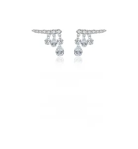 Detailed macro view of S925 sterling silver drop earrings with dangling teardrop zircons