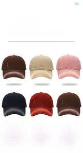Detailed grid view of distressed washed cotton baseball caps in multiple retro colors