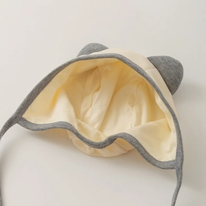 Newborn baby hat with cute cat ears and tie-up chin straps in soft knitted cotton