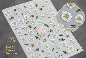 Detailed macro view of 5D daisy and bee embossed nail stickers TS-262 with realistic texture
