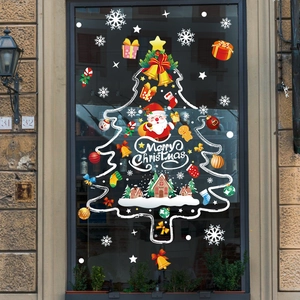 Christmas window sticker featuring Santa Claus, snowflakes, and tree for store decor