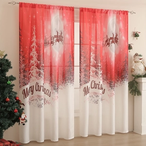 Detail of festive Christmas curtains featuring reindeer silhouettes and Merry Christmas text
