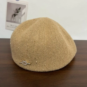 Knitted khaki visor beret for women with sequins and a silver heart knot ornament