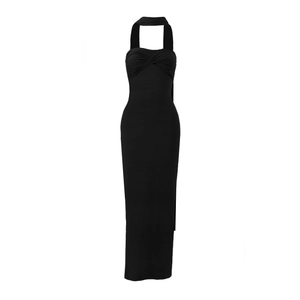 Detailed view of the halter neckline and front twist knot detail on this black maxi dress